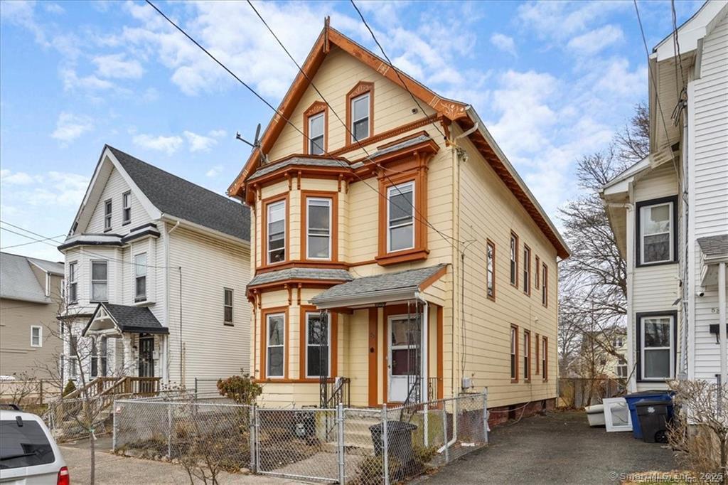 55 Admiral Street, Unit 2 New Haven, CT 06511 - Photo 35 of 35 a view of a white house with large windows