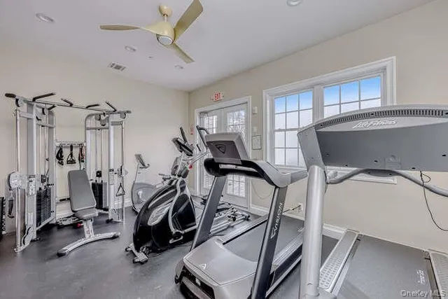 a kitchen with a sink stove top oven and refrigerator