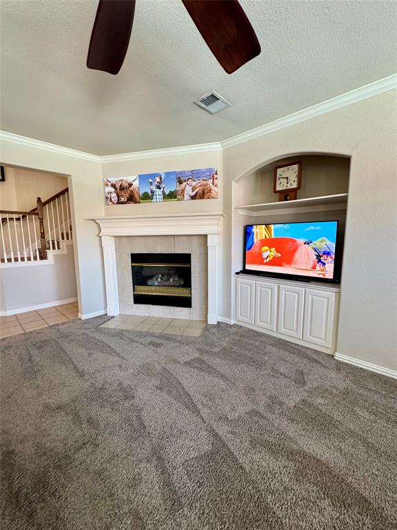 2016 Postwood Court Corinth, TX 76210 - Photo 13 of 39 a living room with furniture and a fireplace