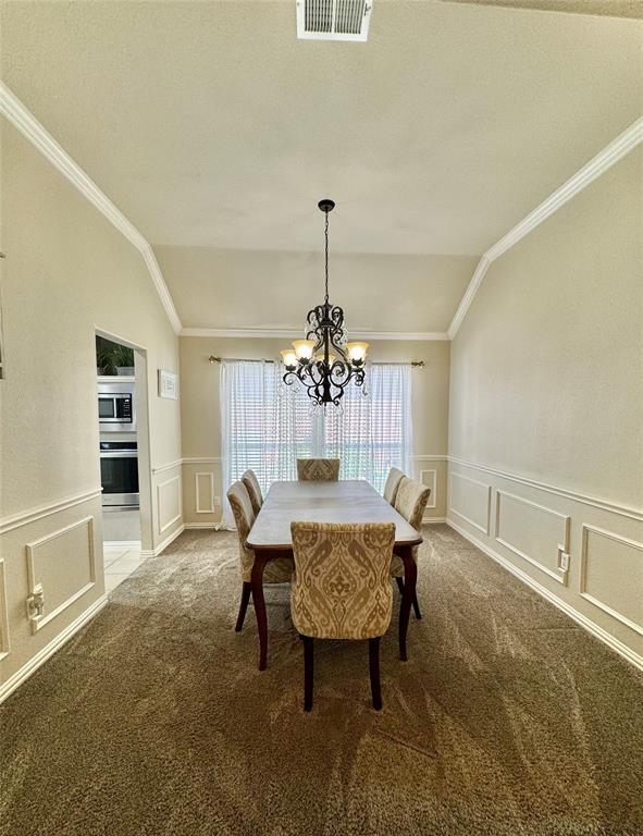 2016 Postwood Court Corinth, TX 76210 - Photo 15 of 39 a dining room with furniture and window