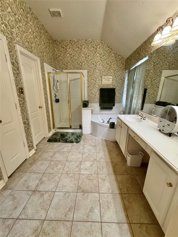 2016 Postwood Court Corinth, TX 76210 - Photo 18 of 39 a bathroom with a sink a toilet and mirror
