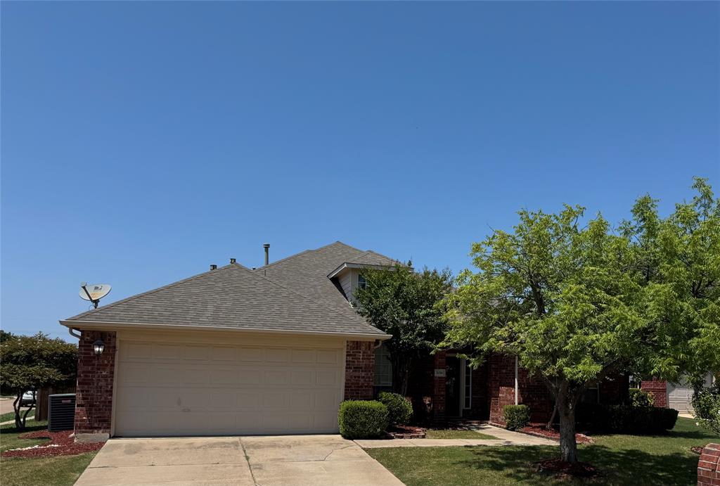 2016 Postwood Court Corinth, TX 76210 - Photo 24 of 39 a house with trees in the background
