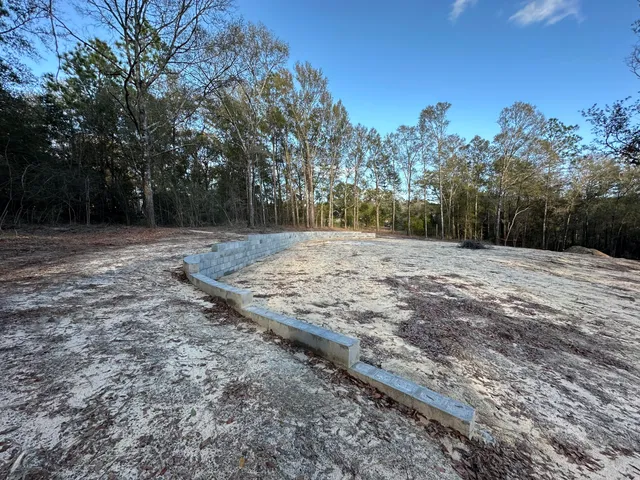 a view of a backyard of a house