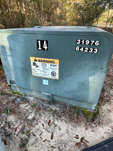 a sign that is on the side of a road