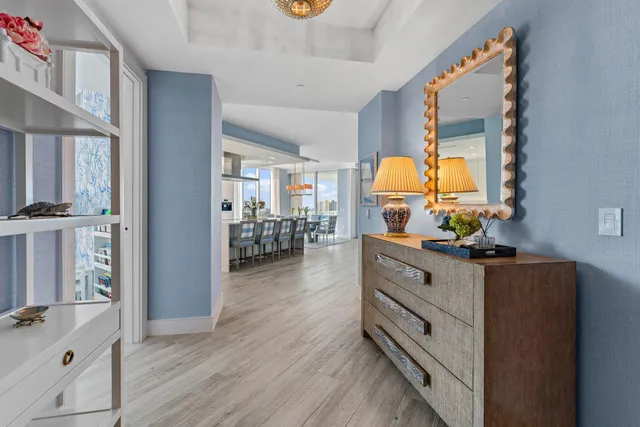 a kitchen with stainless steel appliances granite countertop a stove and cabinets