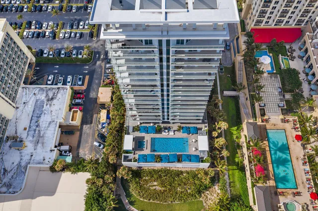 a view of a yard with an ocean