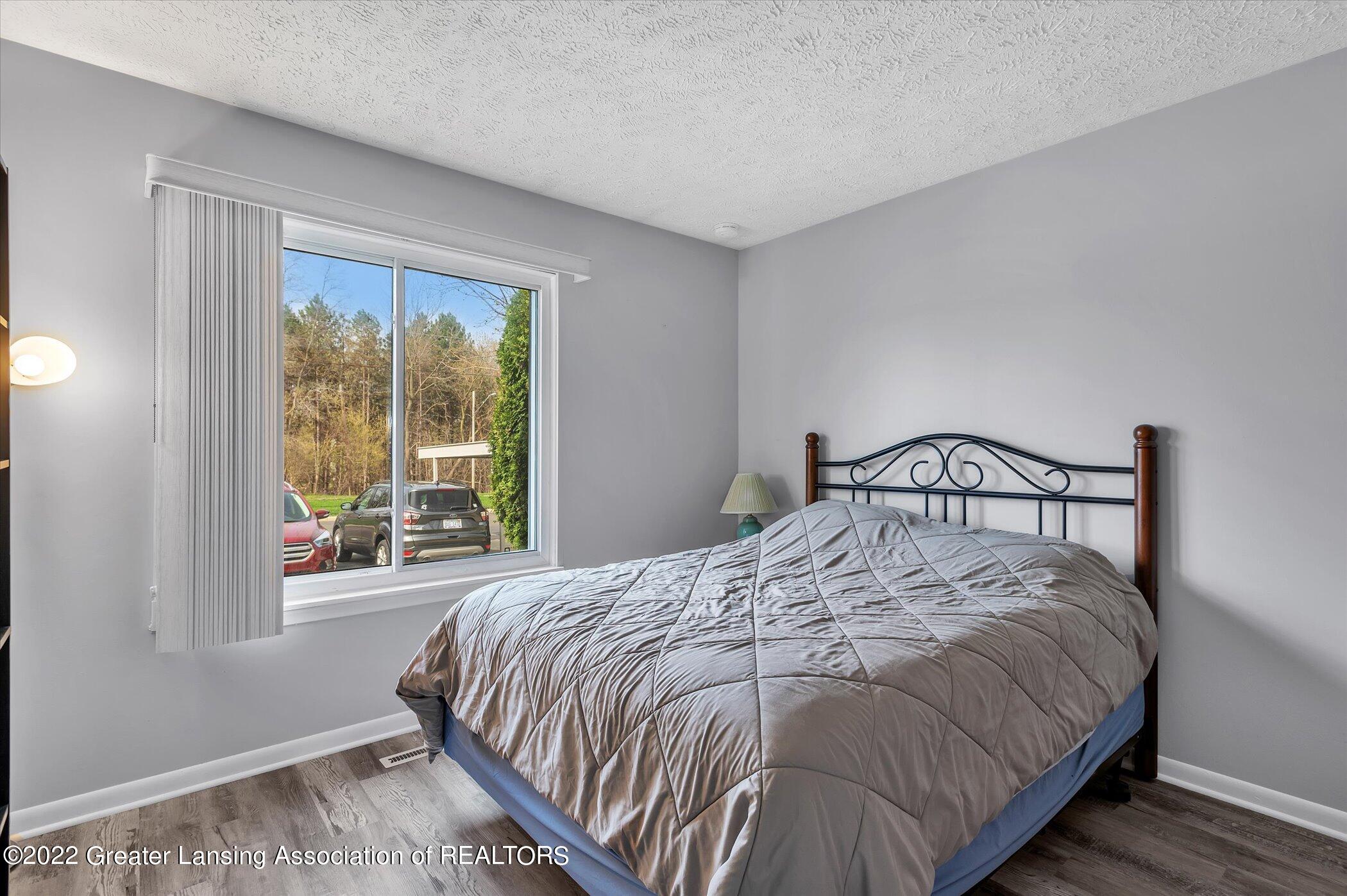 2085 East Lake Lansing Road Haslett, MI 48840 - Photo 14 of 22 15-2085-Lake-Lansing-Rd-WindowStill-Real