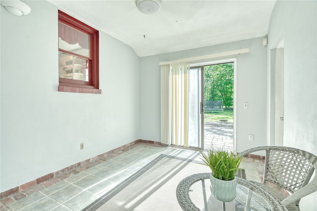 606 Bay Road Webster, NY 14580 - Photo 19 of 49 Breezeway/sunroom adjoining the garage and kitchen