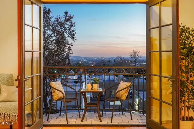 a bathroom with a granite countertop sink a toilet and bathtub