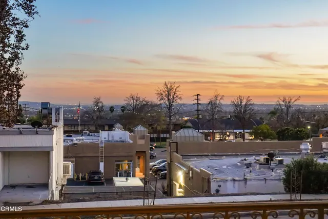 a bathroom with a shower and toilet