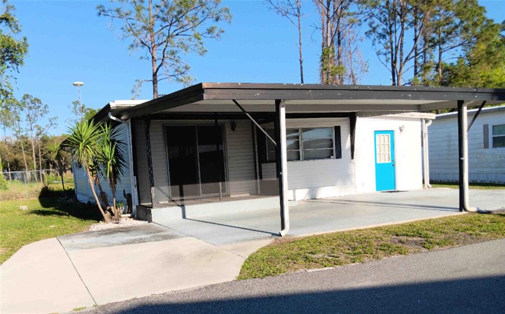 132 Lakeside Ranch Winter Haven, FL 33881 - Photo 1 of 1 a view of a entryway door of the house