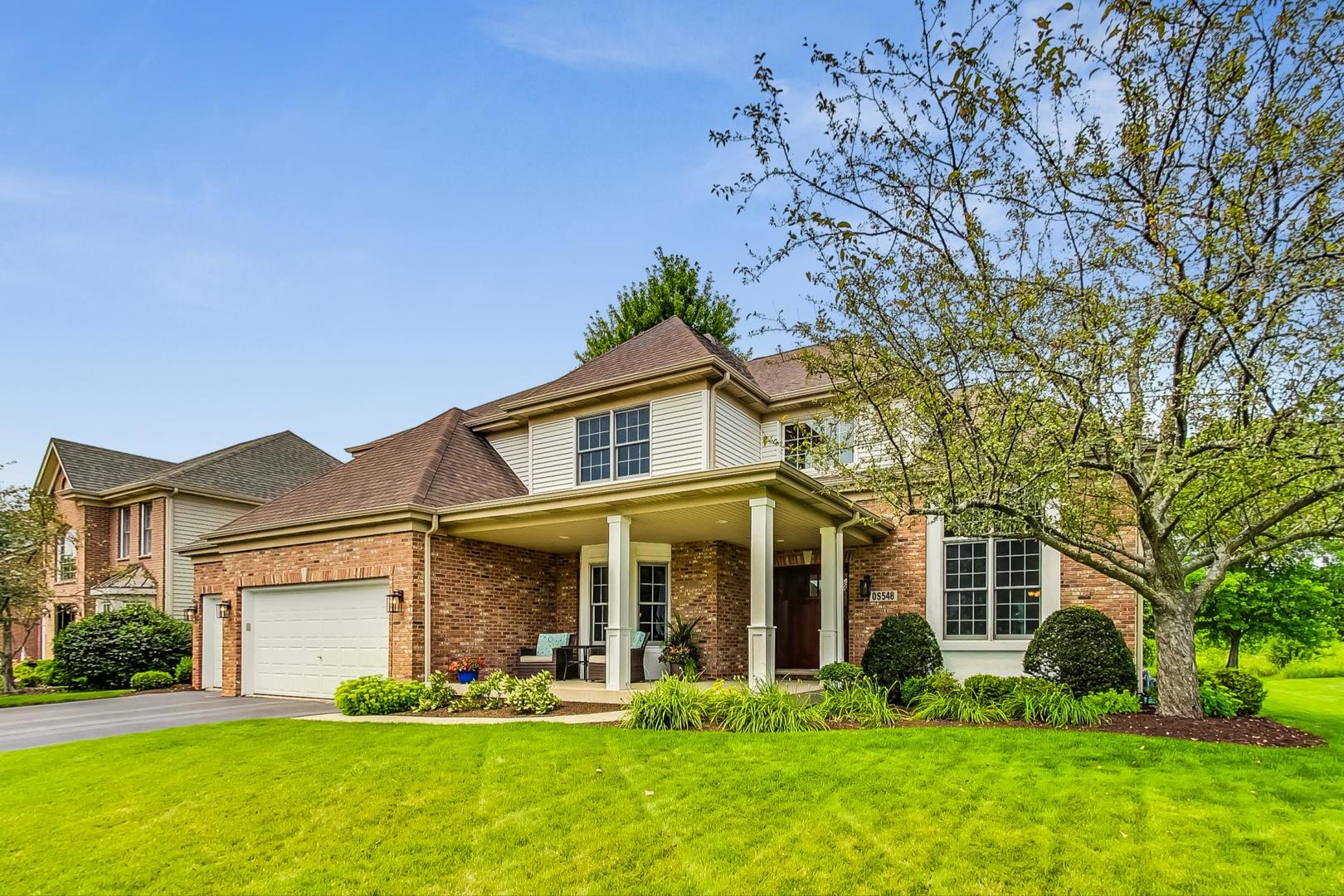 S548 Grengs Lane Geneva, IL 60134 - Photo 2 of 49 front view of a house with a yard