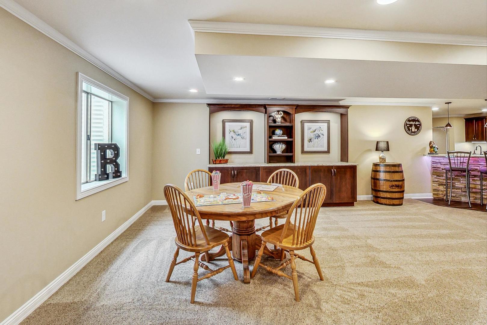 S548 Grengs Lane Geneva, IL 60134 - Photo 34 of 49 a dining room with furniture and window