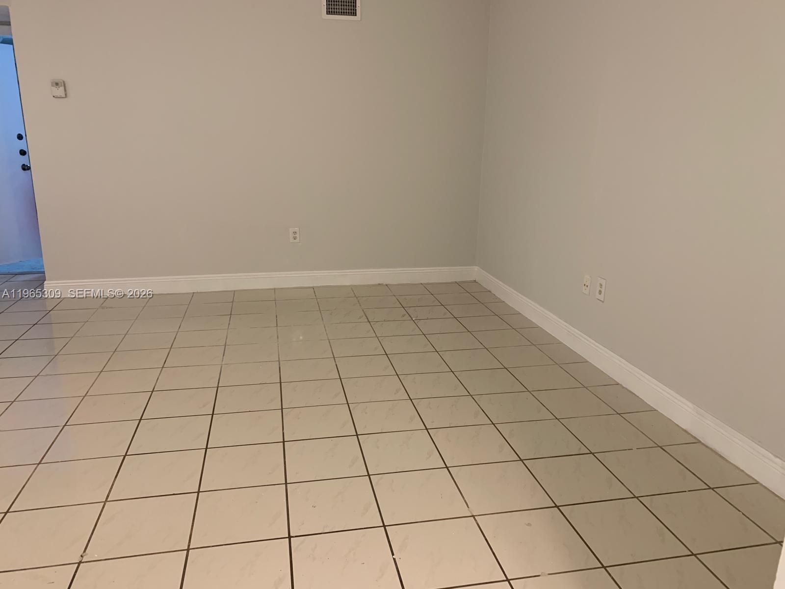 12447 Northwest 7th Street Miami, FL 33172 - Photo 13 of 29 a view of empty room