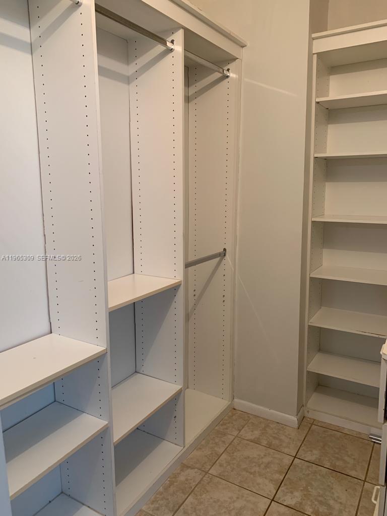 12447 Northwest 7th Street Miami, FL 33172 - Photo 15 of 29 a view of an empty walk in closet