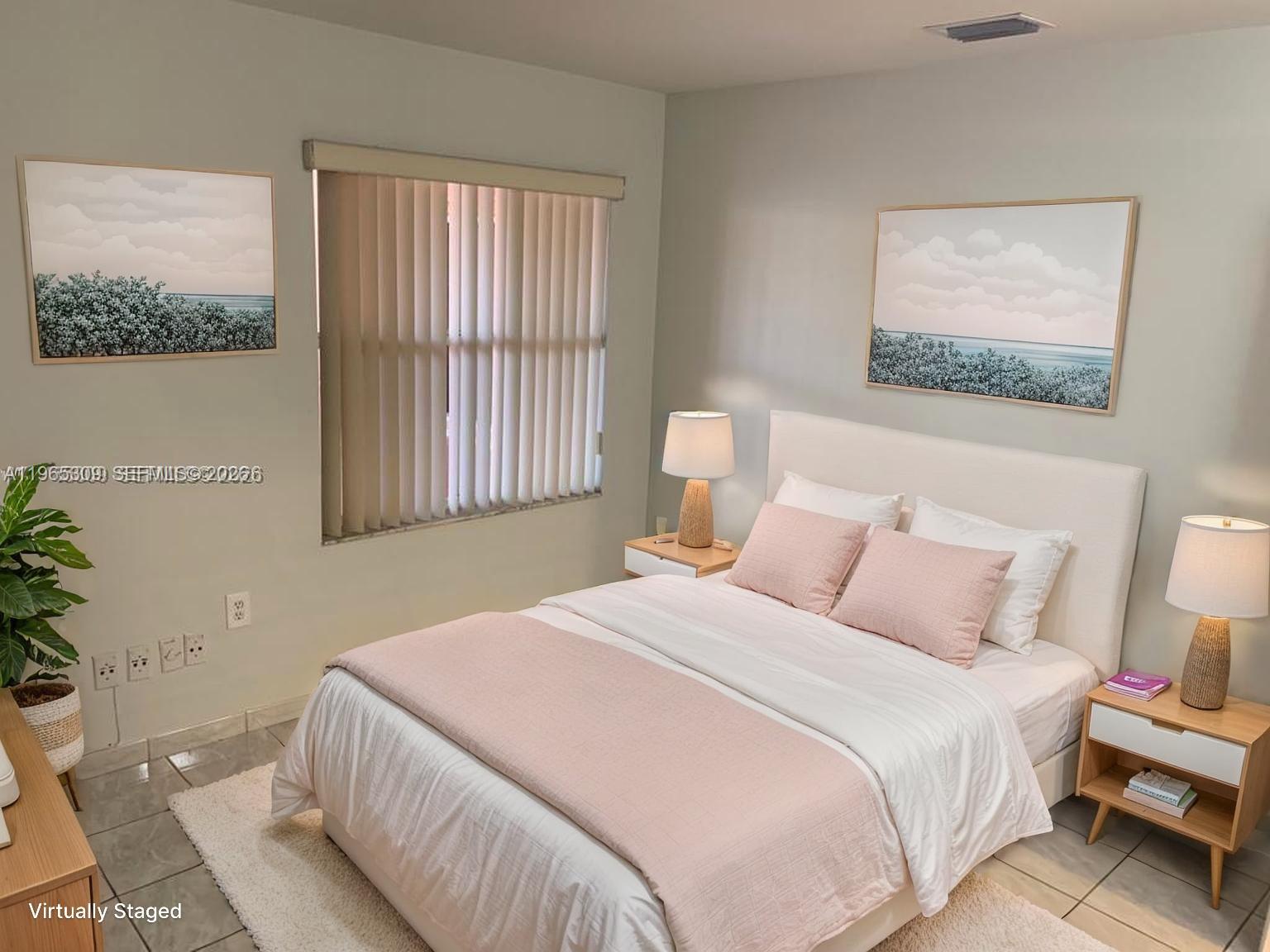 12447 Northwest 7th Street Miami, FL 33172 - Photo 18 of 29 a bedroom with a bed and a window