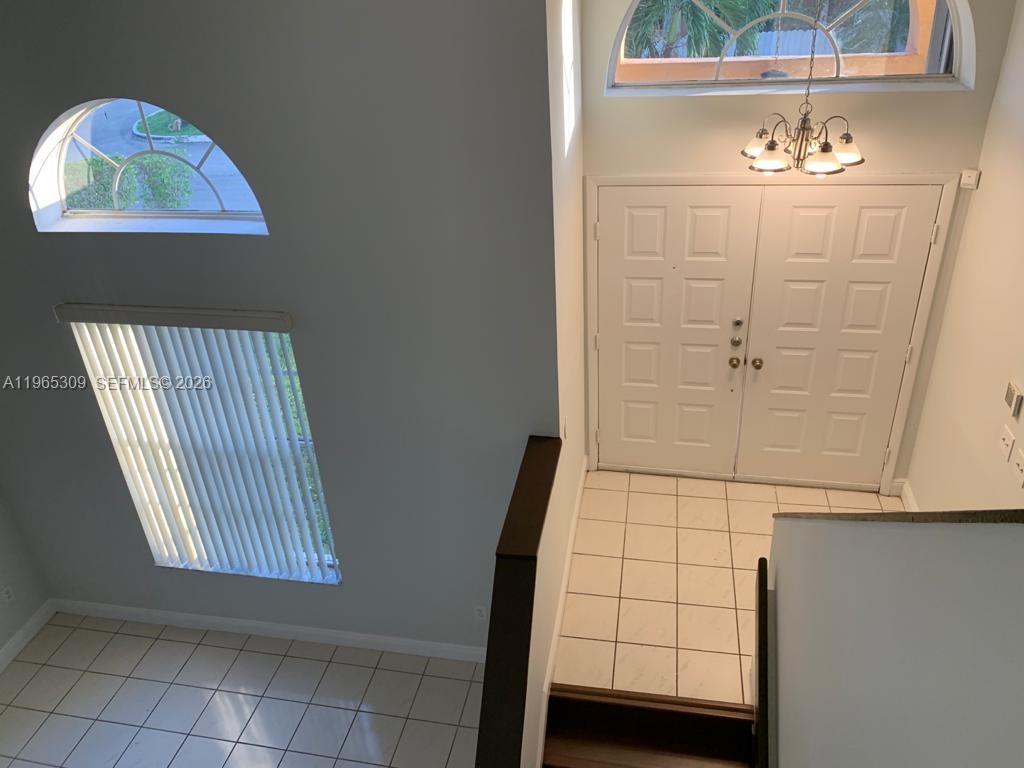 12447 Northwest 7th Street Miami, FL 33172 - Photo 2 of 29 view of room with window