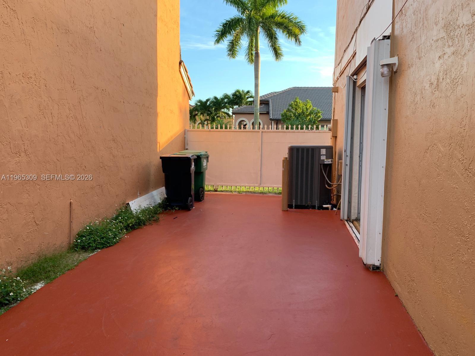 12447 Northwest 7th Street Miami, FL 33172 - Photo 26 of 29 a view of a backyard