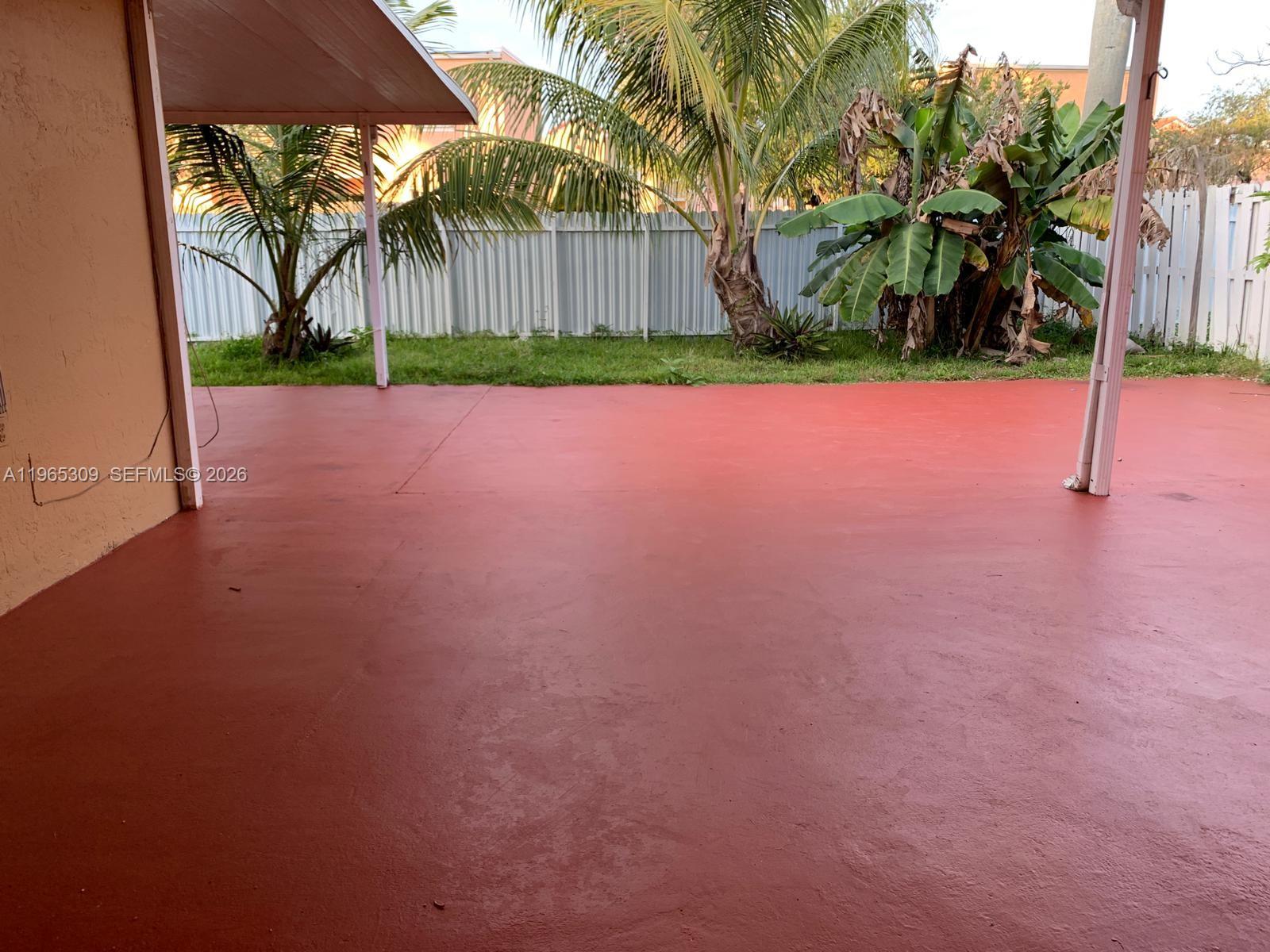 12447 Northwest 7th Street Miami, FL 33172 - Photo 29 of 29 a view of a yard with palm trees