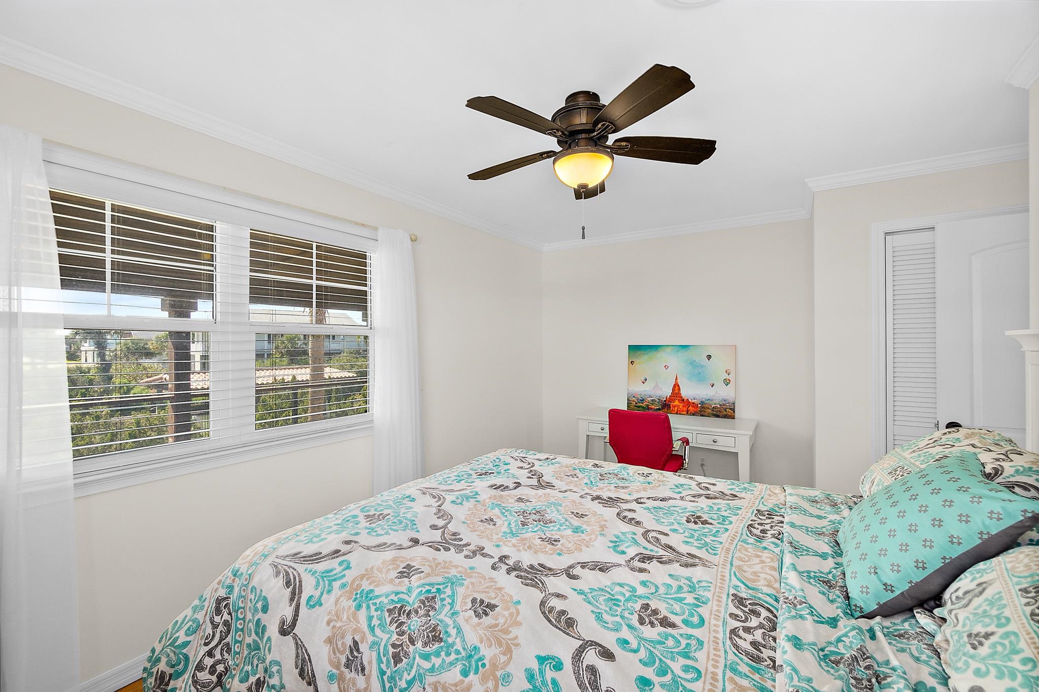 8851 South A1a Street St. Augustine, FL 32080 - Photo 36 of 50 a bedroom with a bed and a window