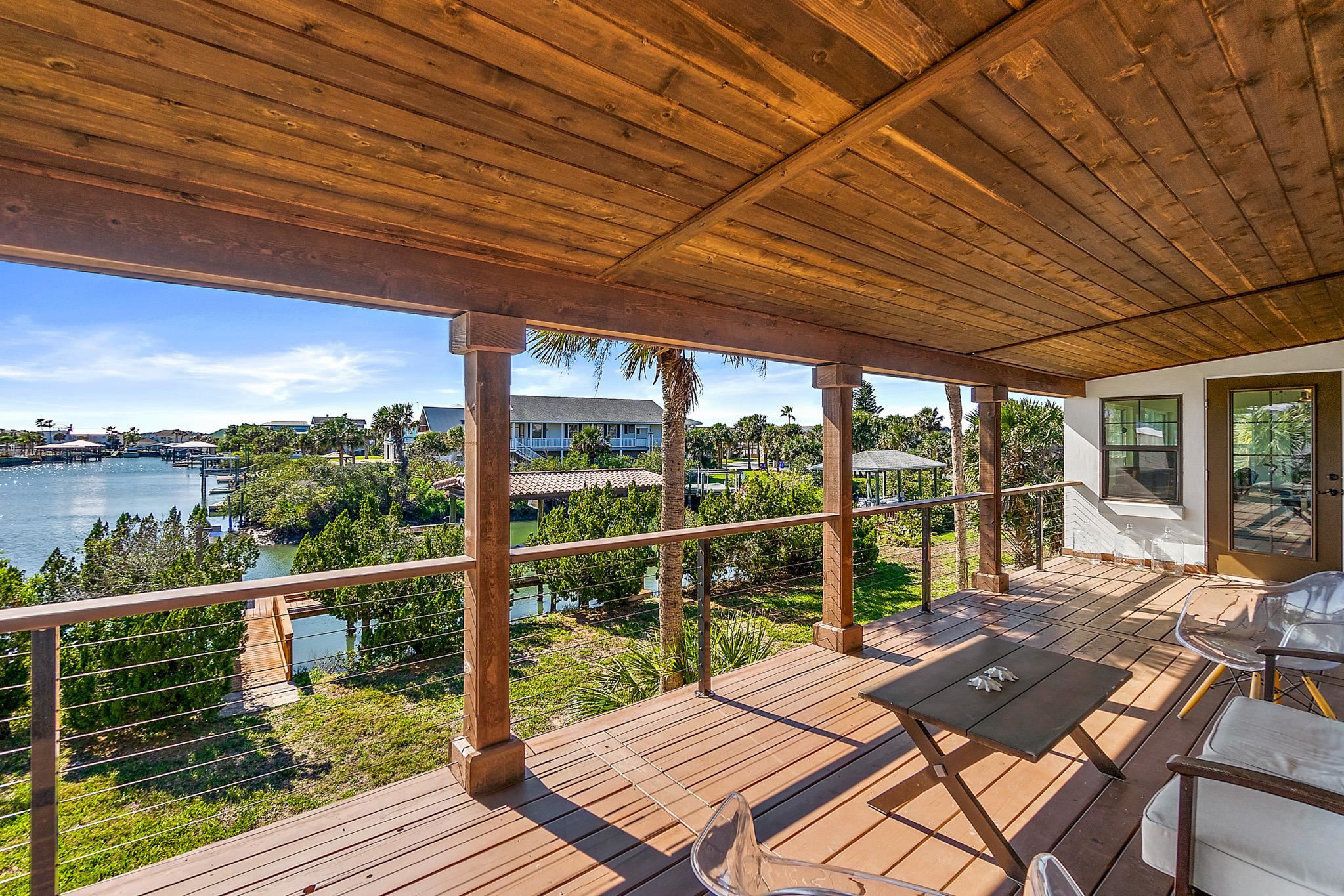 8851 South A1a Street St. Augustine, FL 32080 - Photo 38 of 50 a view of a patio with wooden floor