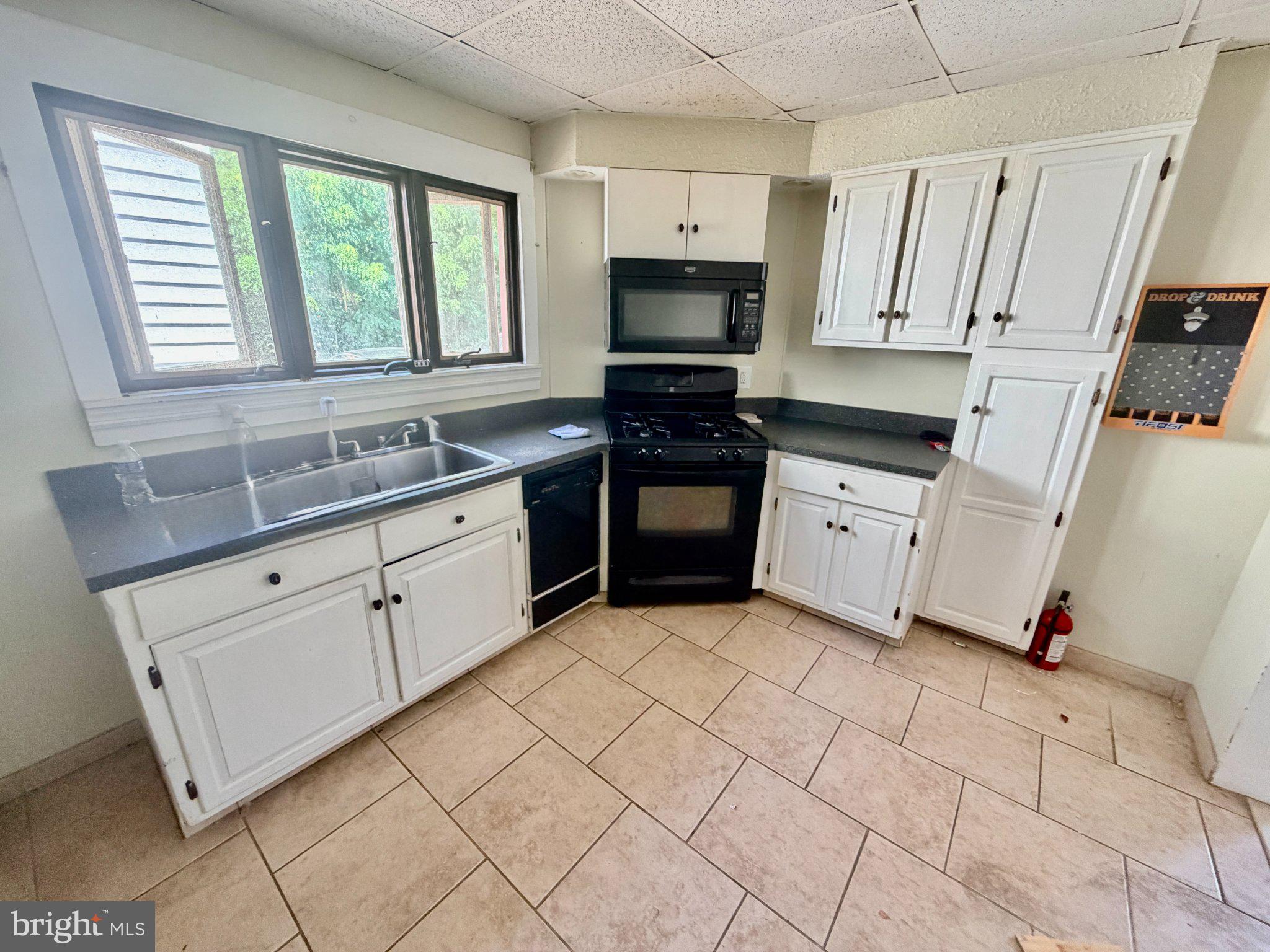 2560 Nottingham Way Hamilton, NJ 08619 - Photo 4 of 12 Cozy kitchen with modern finishes.
