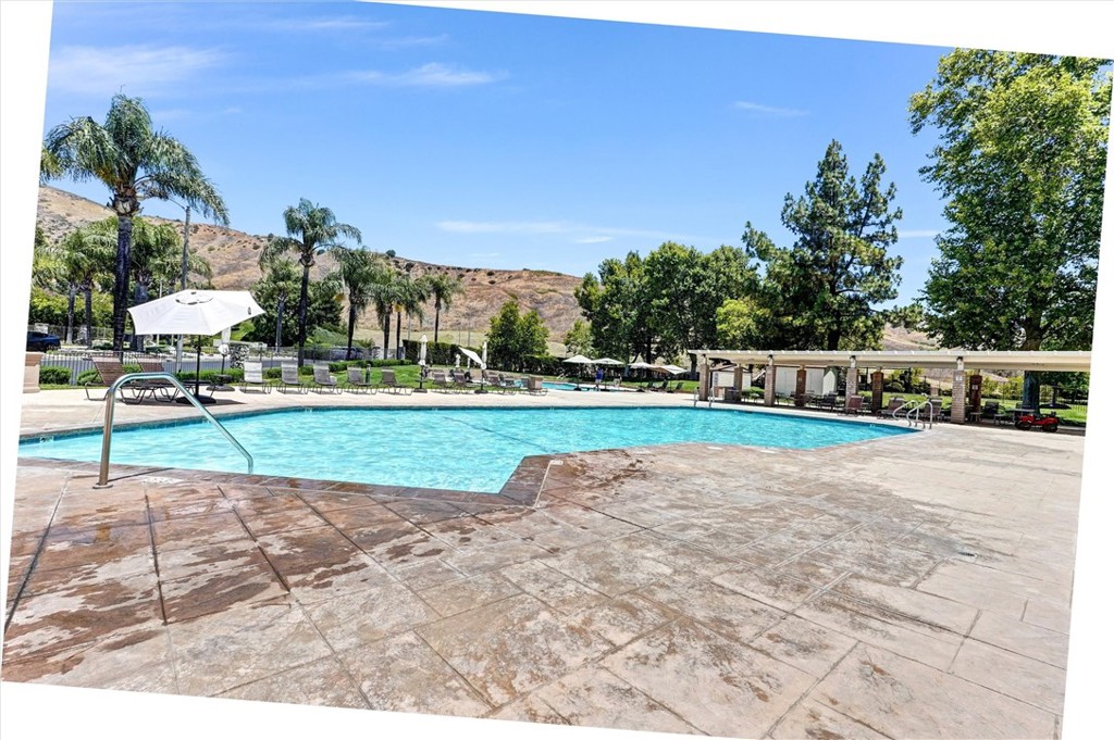 19605 Shadow Springs Way Porter Ranch, CA 91326 - Photo 28 of 33 Close up view of a pool.
