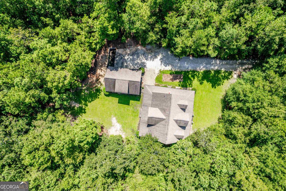 1991 Armour Bridge Road Greensboro, GA 30642 - Photo 2 of 41 an aerial view of a house with a yard