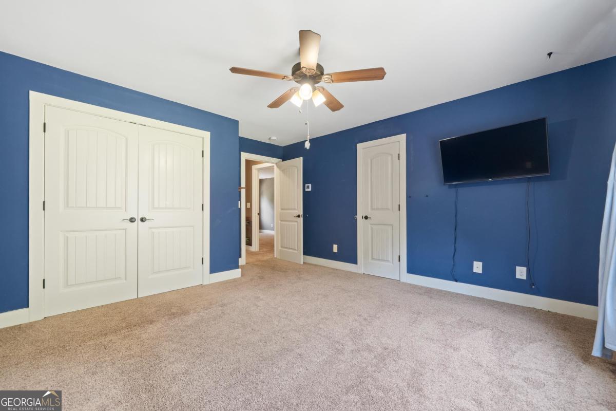 1991 Armour Bridge Road Greensboro, GA 30642 - Photo 33 of 41 a view of a livingroom with a flat screen tv