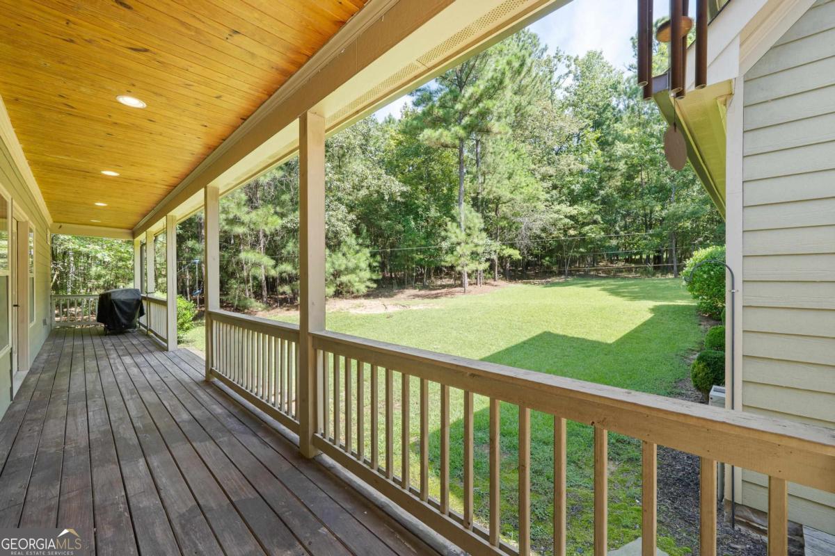 1991 Armour Bridge Road Greensboro, GA 30642 - Photo 38 of 41 a view of a balcony with wooden floor