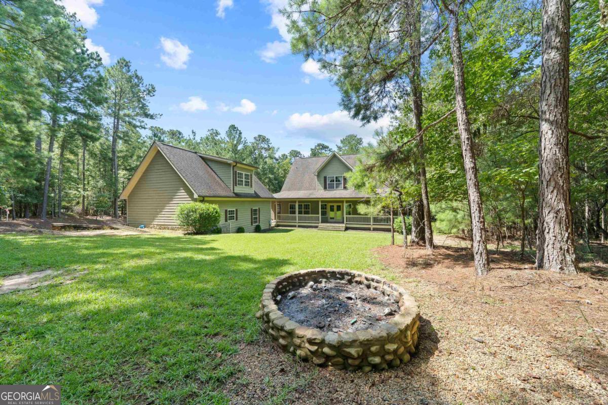 1991 Armour Bridge Road Greensboro, GA 30642 - Photo 41 of 41 a view of a house with a yard