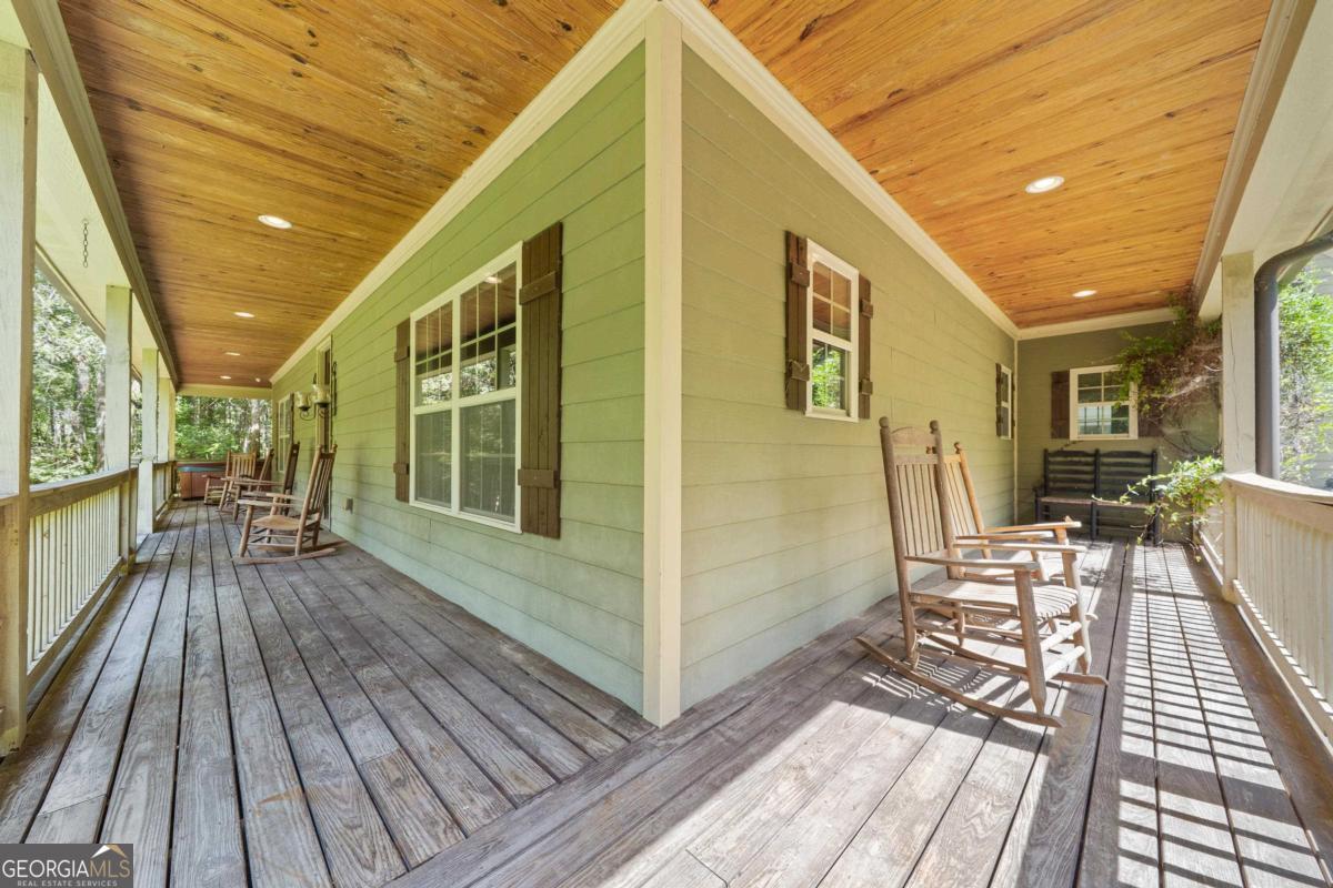 1991 Armour Bridge Road Greensboro, GA 30642 - Photo 6 of 41 a view of a house with a patio