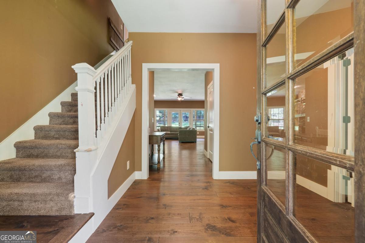 1991 Armour Bridge Road Greensboro, GA 30642 - Photo 7 of 41 a view of entryway and hall with wooden floor