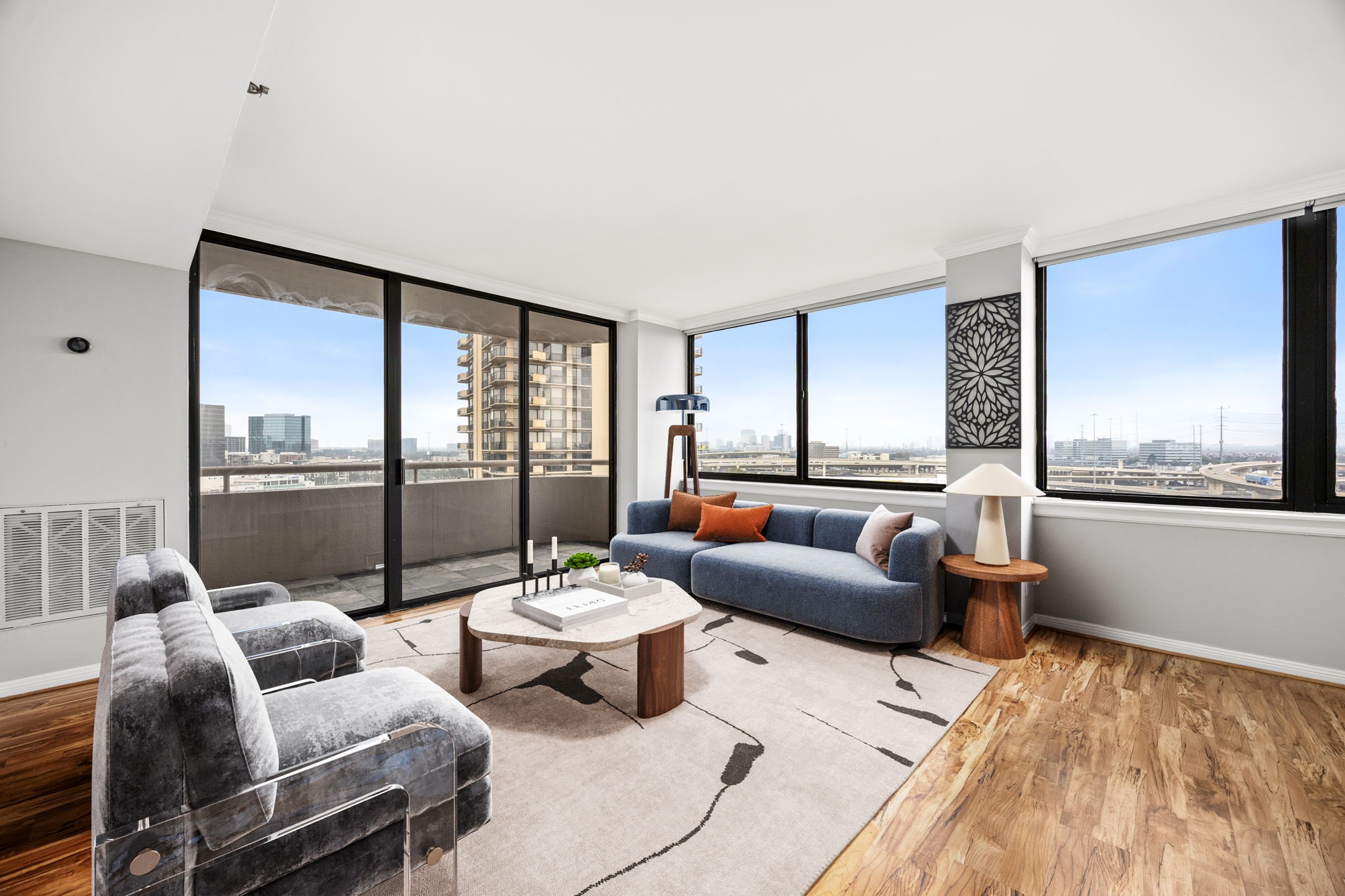 3525 Sage Road, Unit 1409 Houston, TX 77056 - Photo 18 of 45 a living room with furniture and a large window