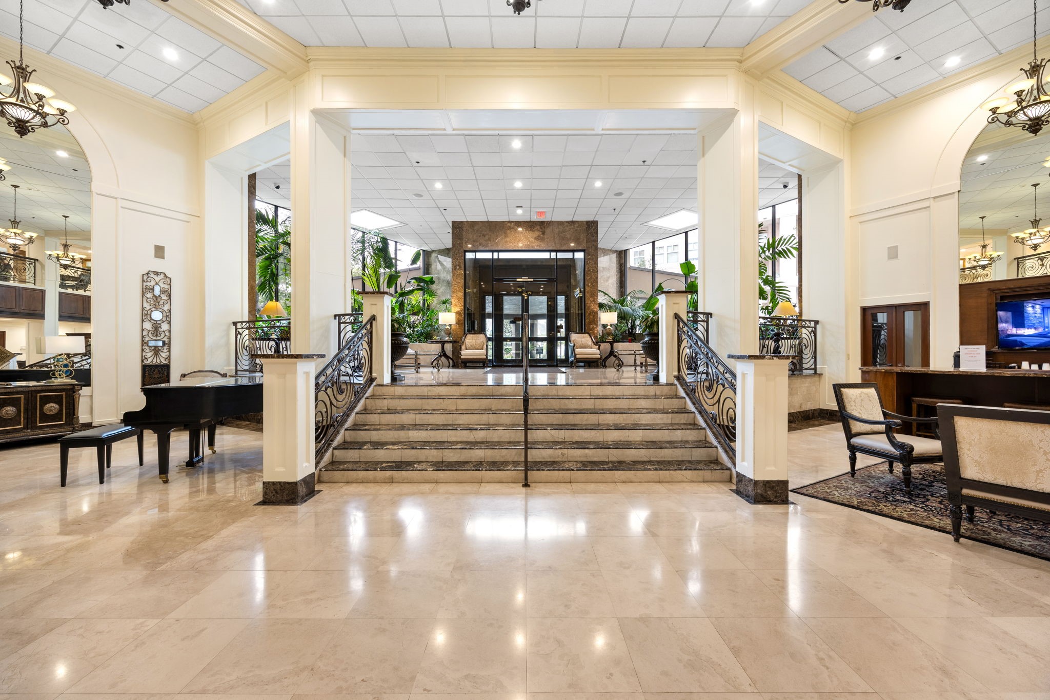 3525 Sage Road, Unit 1409 Houston, TX 77056 - Photo 7 of 45 a view of a lobby with furniture and staircase