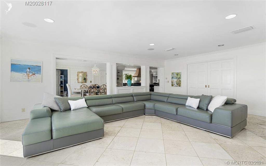 22 East High Point Road Stuart, FL 34996 - Photo 33 of 84 a living room with furniture and a couch