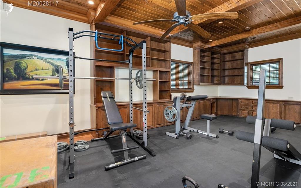 22 East High Point Road Stuart, FL 34996 - Photo 72 of 84 a room with gym equipment