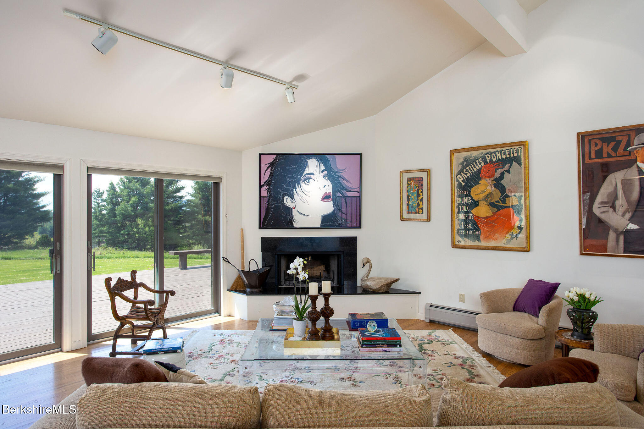 77 Hurlburt Road Great Barrington, MA 01230 - Photo 15 of 48 a living room with fireplace furniture and floor to ceiling windows