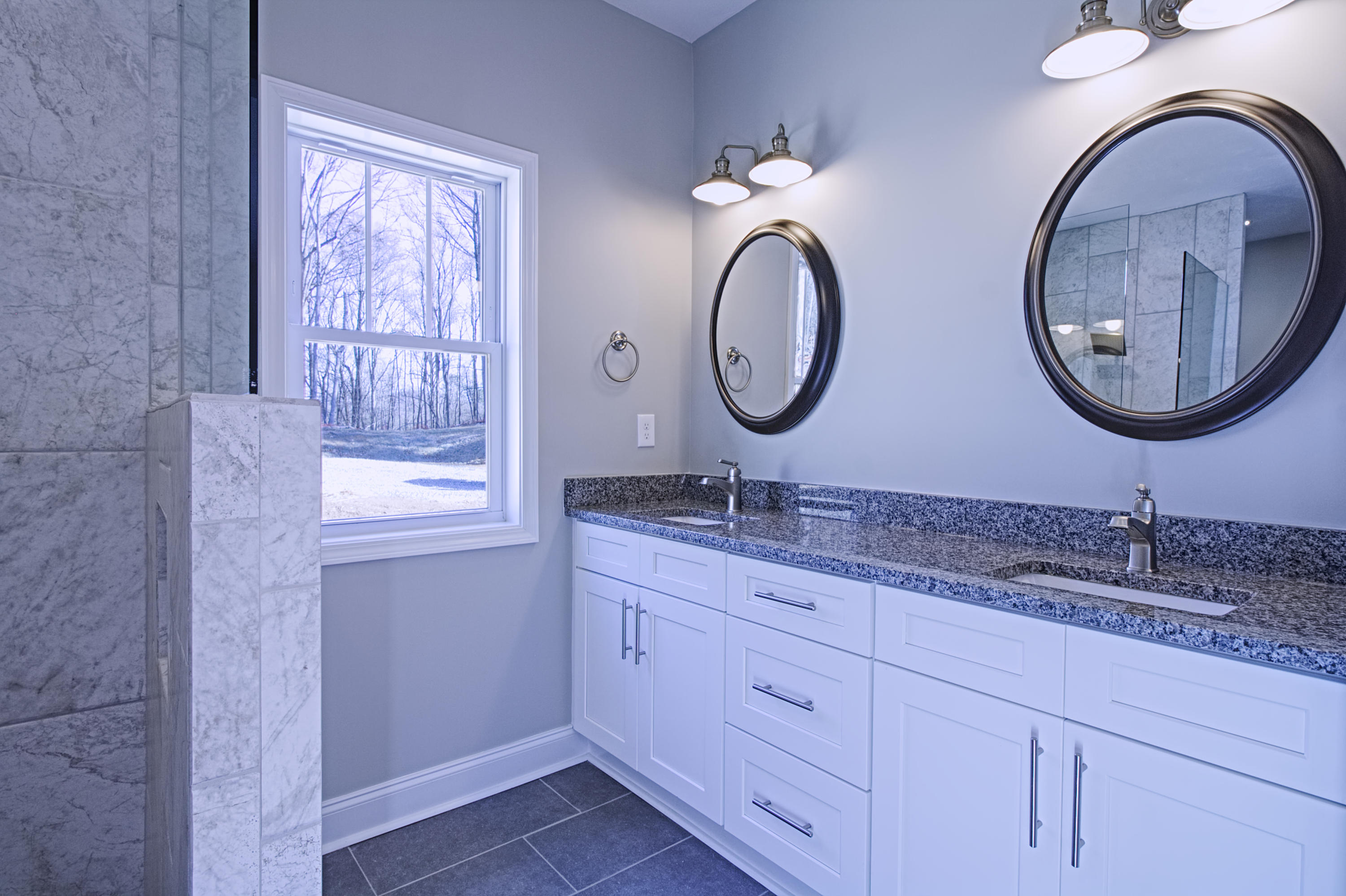 4281 Daugherty Road Salem, VA 24153 - Photo 9 of 21 a bathroom with a granite countertop double vanity sink and a mirror