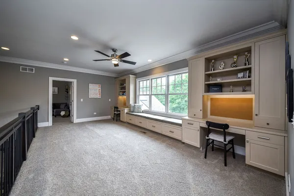 a kitchen with a table and chairs in it