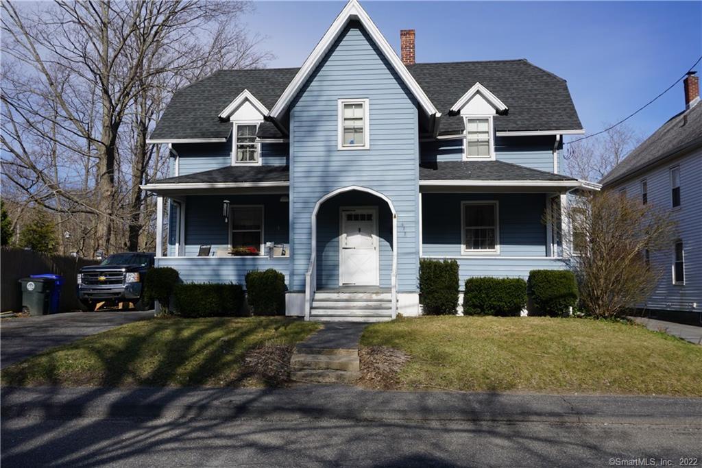 422 Riverside Avenue Torrington, CT 06790 - Photo 1 of 1 a front view of a house with a yard