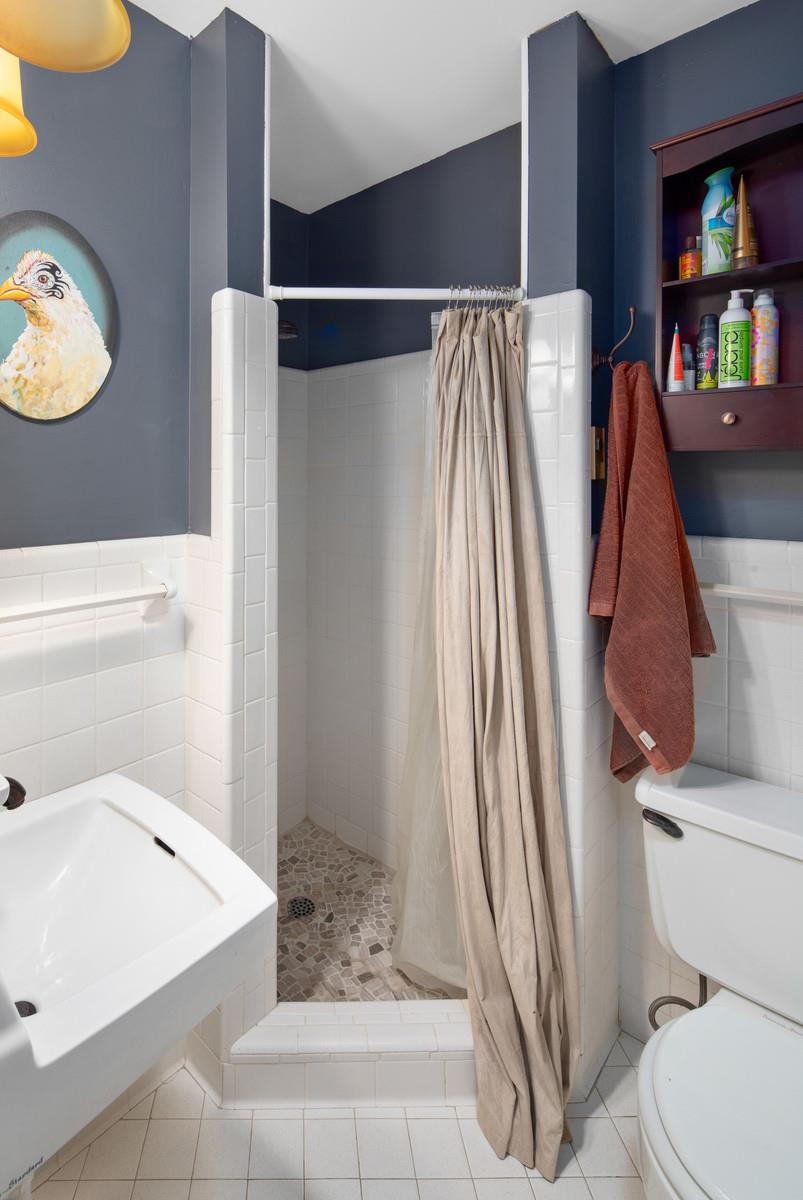2413 Porter Road Nashville, TN 37206 - Photo 19 of 29 a bathroom with a sink and a toilet