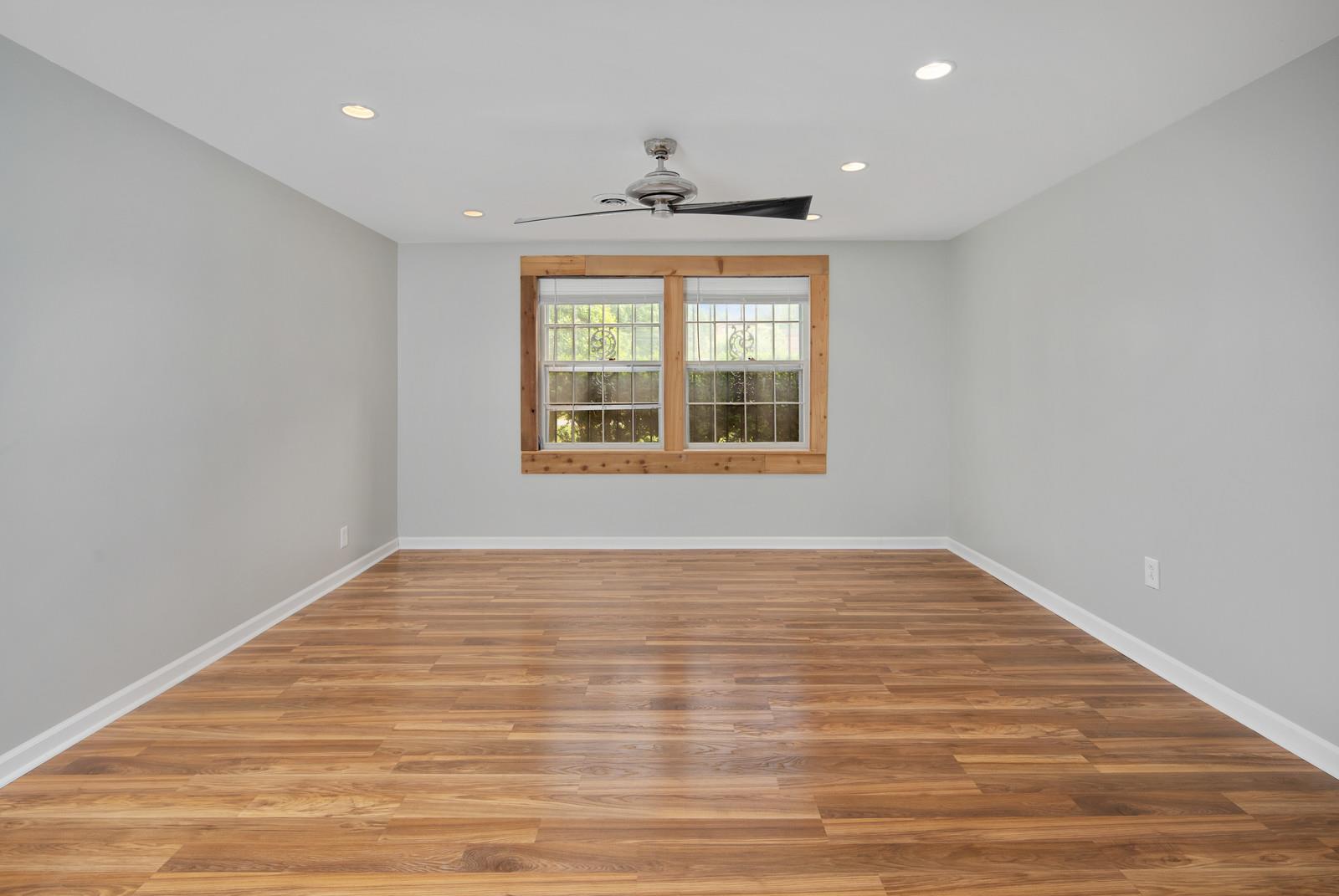 2413 Porter Road Nashville, TN 37206 - Photo 22 of 29 a view of an empty room with wooden floor and a window