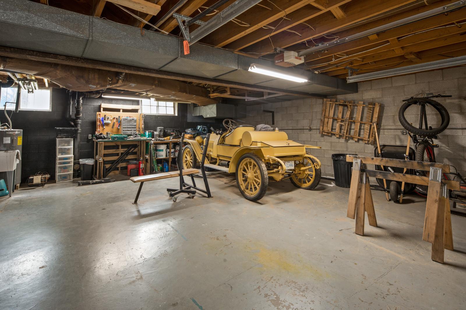 2413 Porter Road Nashville, TN 37206 - Photo 26 of 29 a view of parking garage with cars
