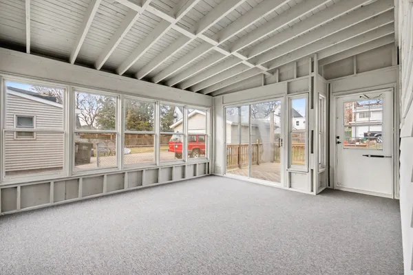 a big room with natural light in front of it