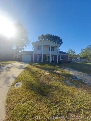 a view of a house with a swimming pool