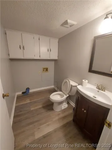 a bathroom with a sink and a toilet