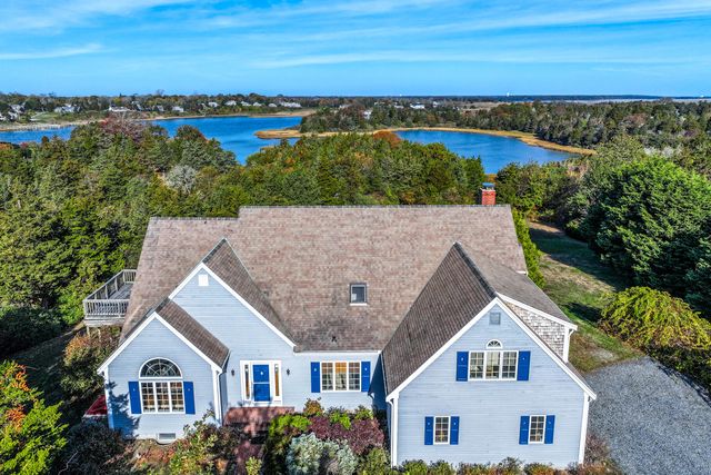 a view of house with ocean view