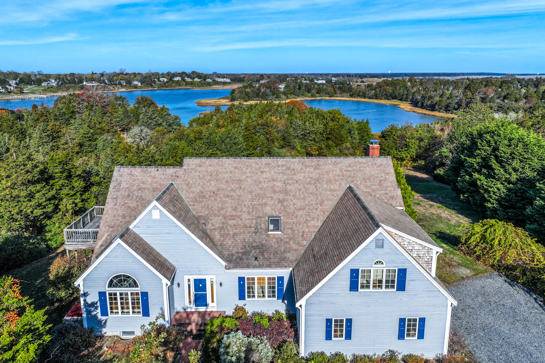 6-12 Snow Way Orleans, MA 02653 - Photo 1 of 42 a view of house with ocean view