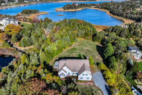 an aerial view of a house with a garden